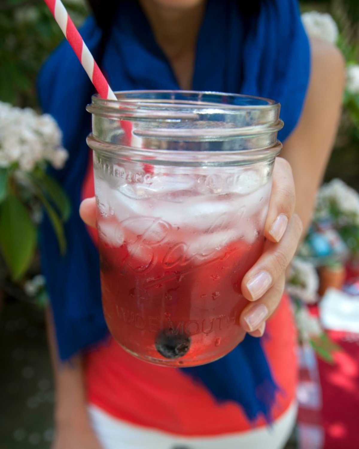red and blue sangria in ball jar